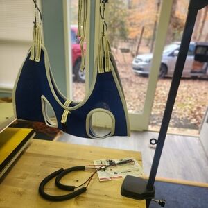 Blue and White Dog Grooming Hammock with stand.